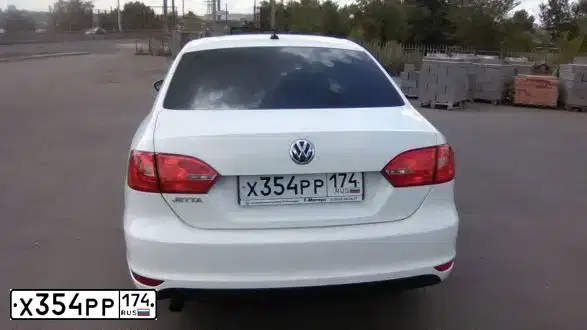 Фото автомобиля VOLKSWAGEN JETTA, 2014 — госномер Х354РР174. Цвет: Белый