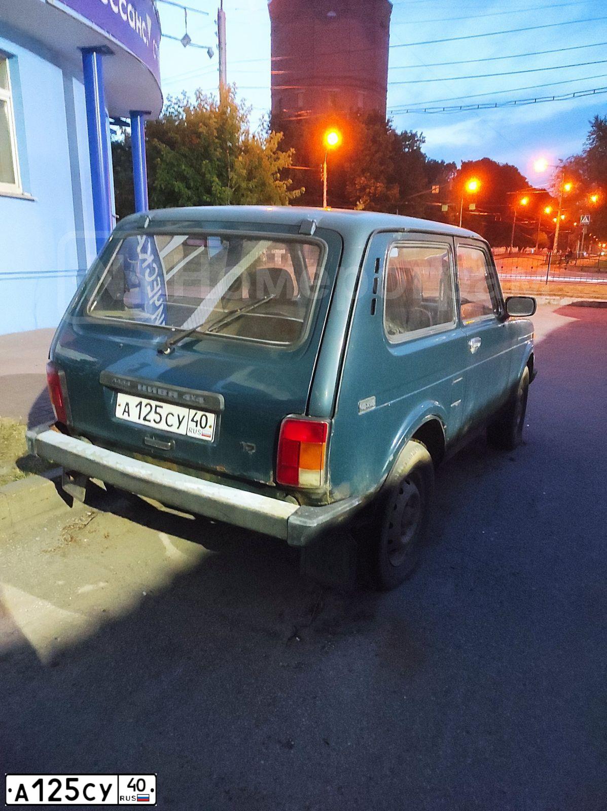 Фото автомобиля LADA 2121 NIVA, 2001 — госномер А125СУ40. Цвет: Сине-зеленый