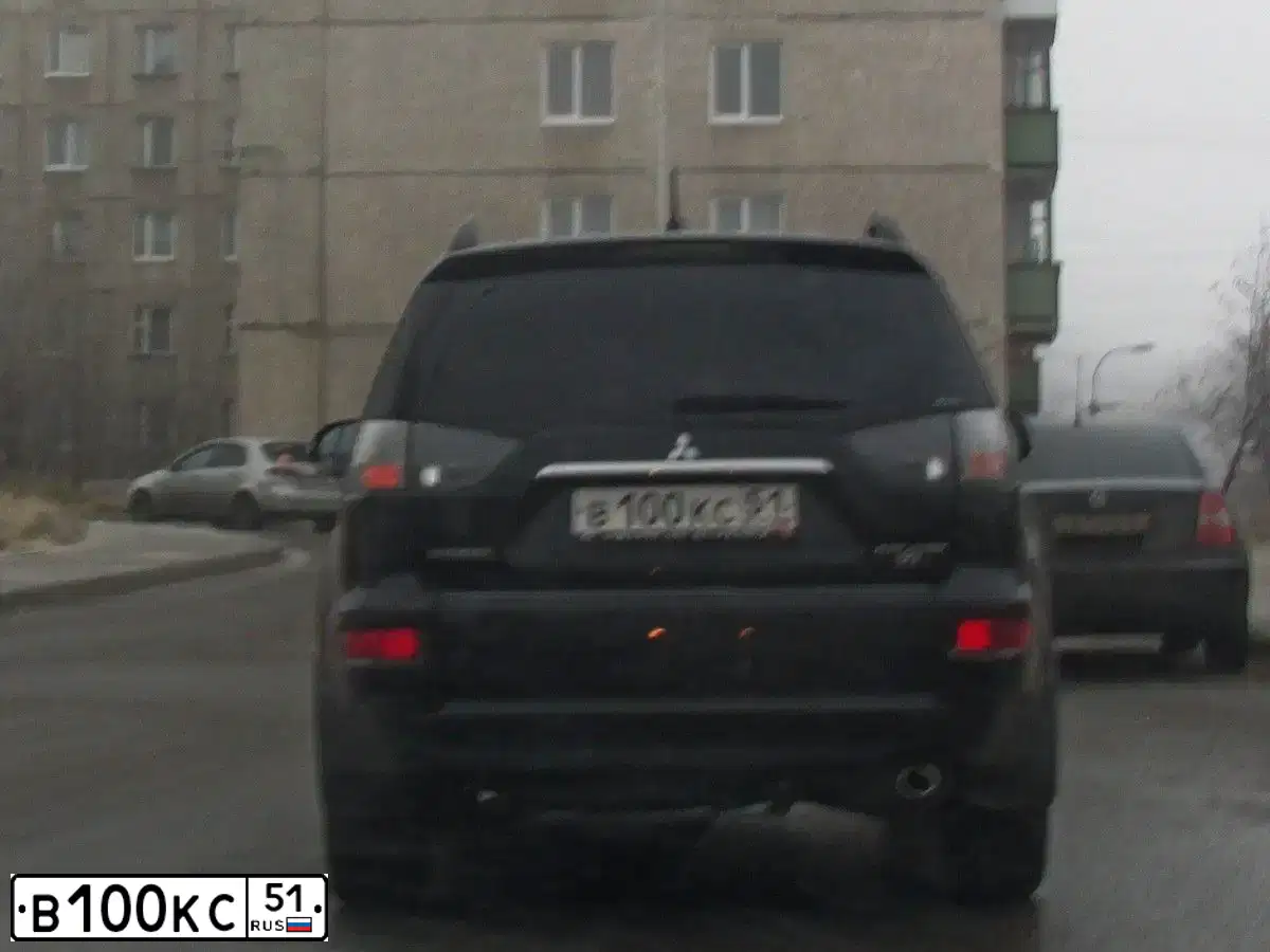 Фото автомобиля MITSUBISHI LANCER, 2008 — госномер Т603МХ51. Цвет: Красный