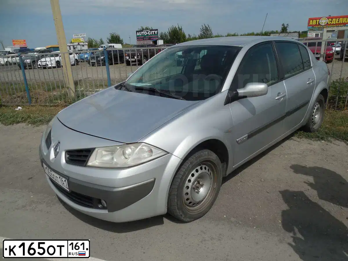 Фото автомобиля RENAULT MEGANE, 2006 — госномер К165ОТ161. Цвет: СВЕТЛО-СЕРО-ГОЛУБОЙ