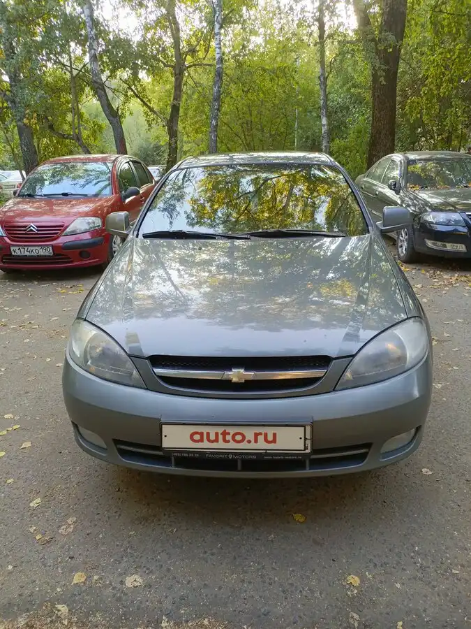 Фото автомобиля CITROEN C3, 2005 — госномер К174КО190. Цвет: Красный