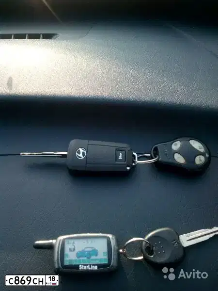 Фото автомобиля HYUNDAI TUCSON, 2007 — госномер С869СН18. Цвет: СЕРЕБРИСТЫЙ