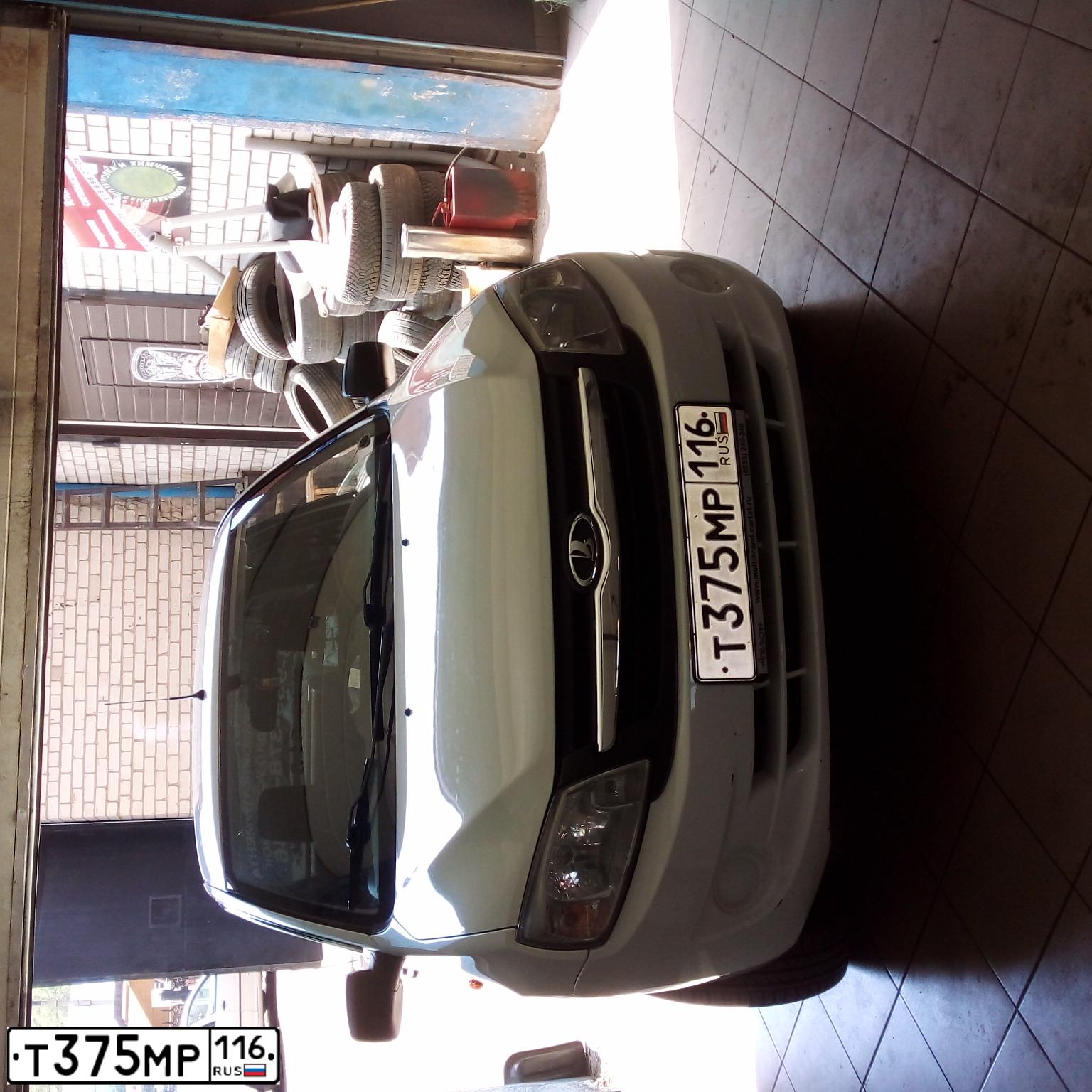 Фото автомобиля LADA 2190 GRANTA, 2013 — госномер Т375МР116. Цвет: Белый