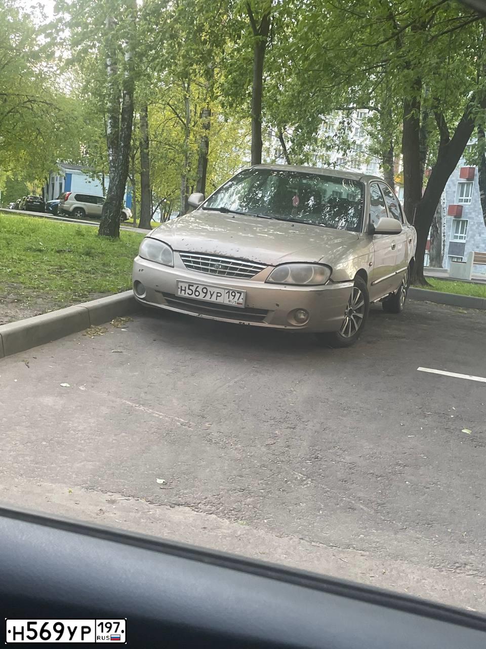 Фото автомобиля KIA SPECTRA, 2007 — госномер Н569УР197. Цвет: ЖЕЛТЫЙ