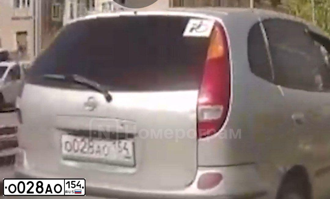 Фото автомобиля LADA 2115 SAMARA, 2003 — госномер О028АО154. Цвет: золотисто-серый