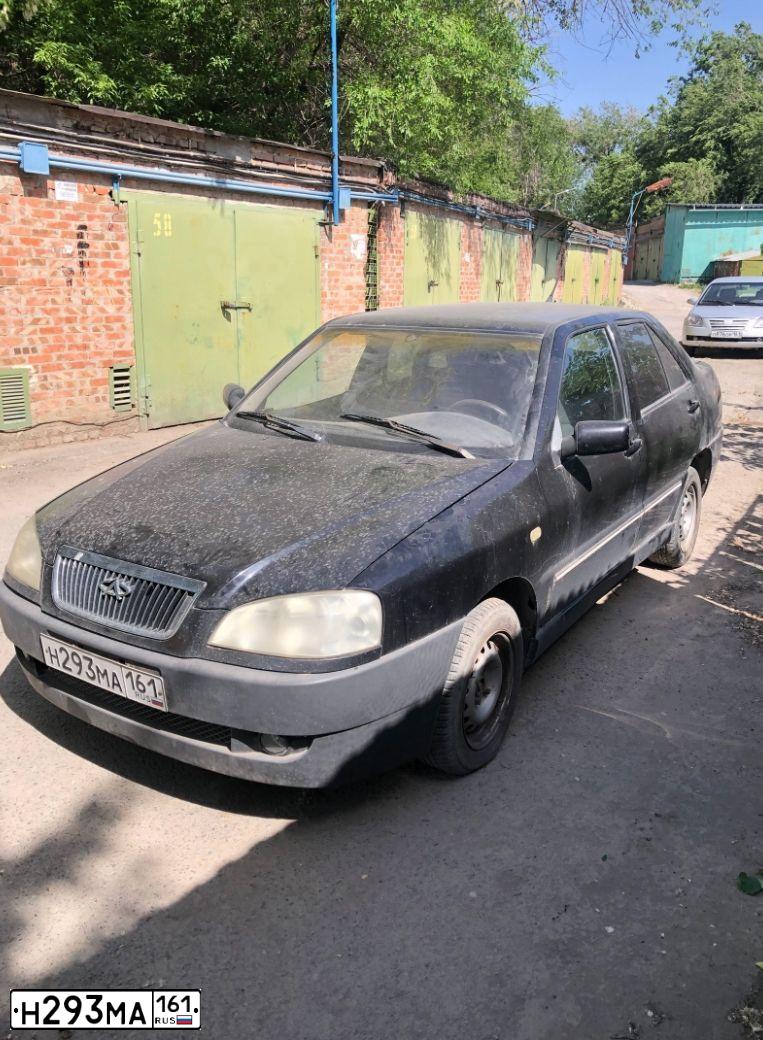 Фото автомобиля CHERY AMULET /FLAGCLOUD/, 2007 — госномер Н293МА161. Цвет: ЧЕРНЫЙ