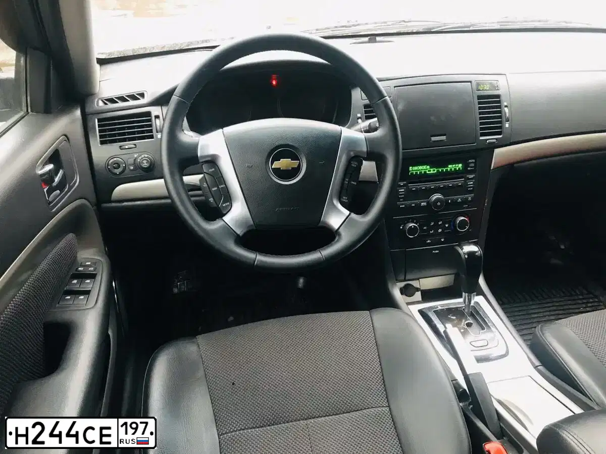 Фото автомобиля CHEVROLET EPICA, 2010 — госномер О928МТ30. Цвет: ЧЕРНЫЙ