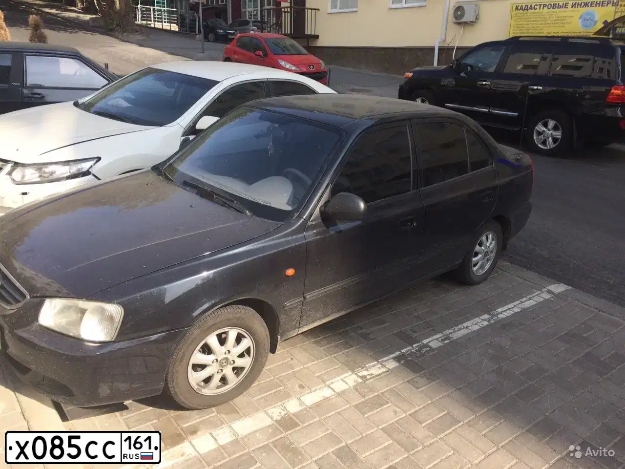 Фото автомобиля TAGAZ ACCENT, 2008 — госномер Е222ХЕ161. Цвет: ЧЕРНЫЙ