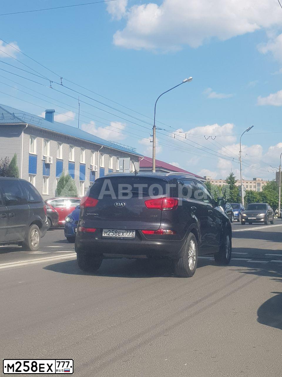 Фото автомобиля KIA SPORTAGE, 2014 — госномер М258ЕХ777. Цвет: СЕРЫЙ