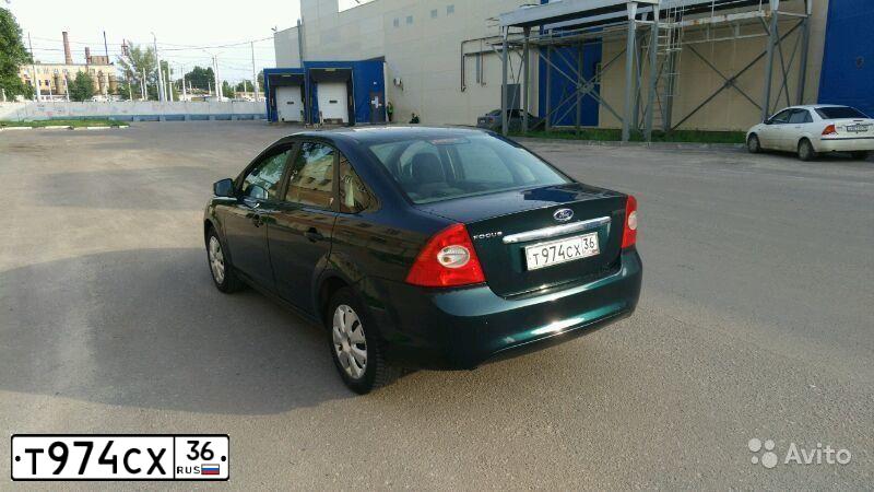 Фото автомобиля FORD FOCUS, 2008 — госномер Т974СХ36. Цвет: Темно-зеленый