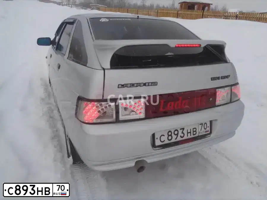 Фото автомобиля LADA 2112, 2006 — госномер С893НВ70. Цвет: Серебристый