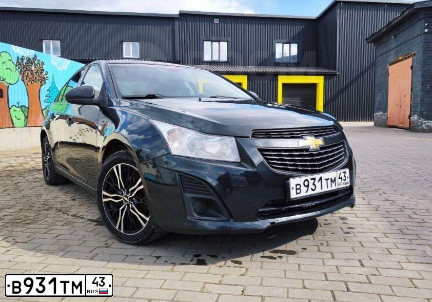 Фото автомобиля CHEVROLET CRUZE, 2012 — госномер Е134КЕ11. Цвет: ЧЕРНЫЙ