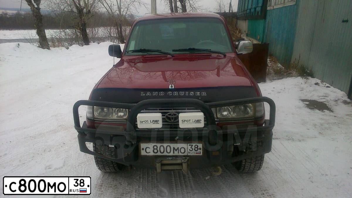 Фото автомобиля TOYOTA LANDCRUISER, 1997 — госномер С800МО38. Цвет: ТЕМНО-КРАСНЫЙ
