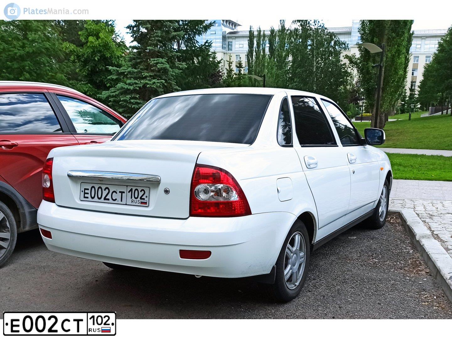 Фото автомобиля ВАЗ 2107, 1987 — госномер Е002СТ102. Цвет: КРАСНЫЙ