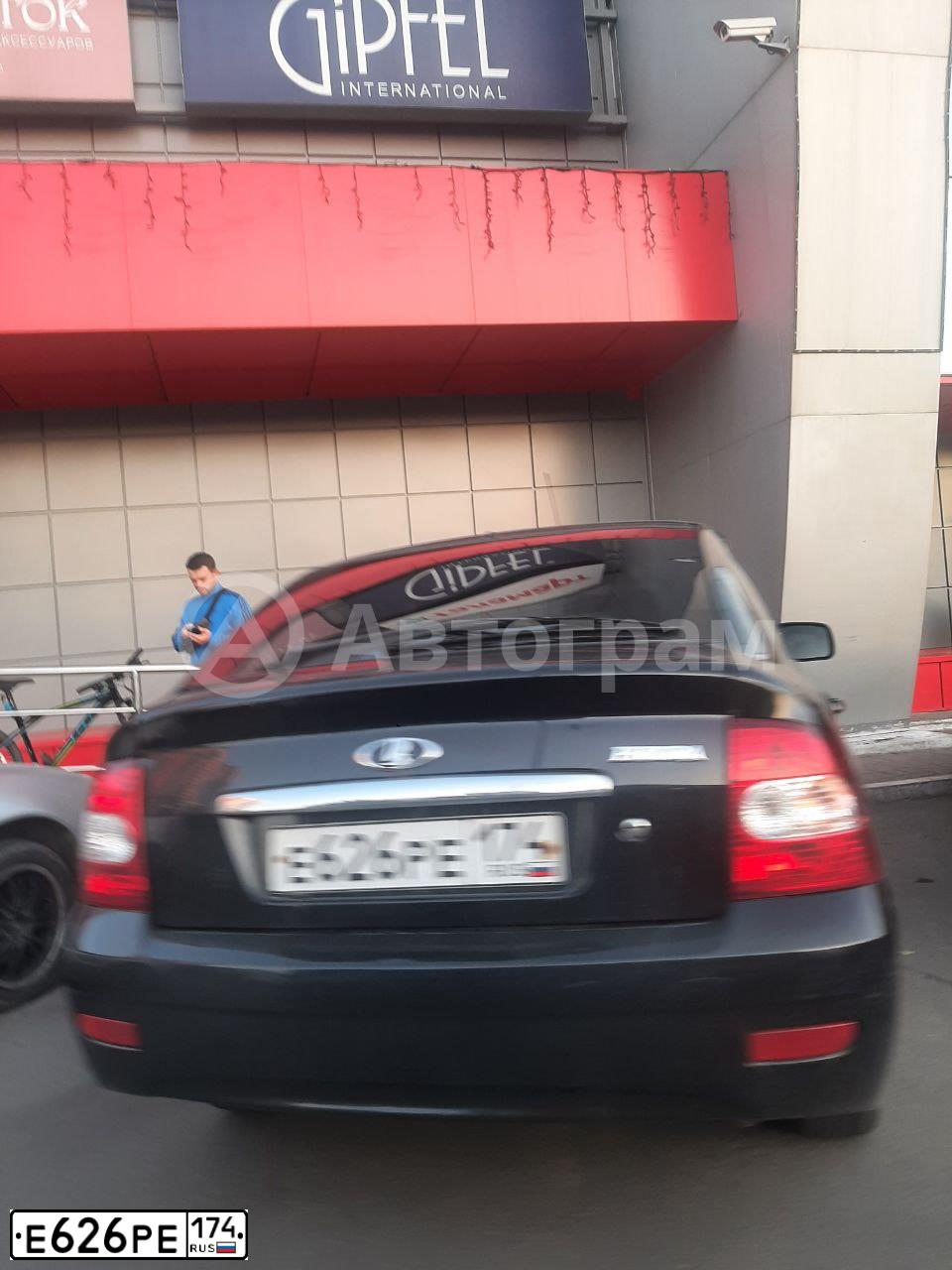 Фото автомобиля LADA 2172 PRIORA, 2012 — госномер Е626РЕ174. Цвет: Сине-Черный