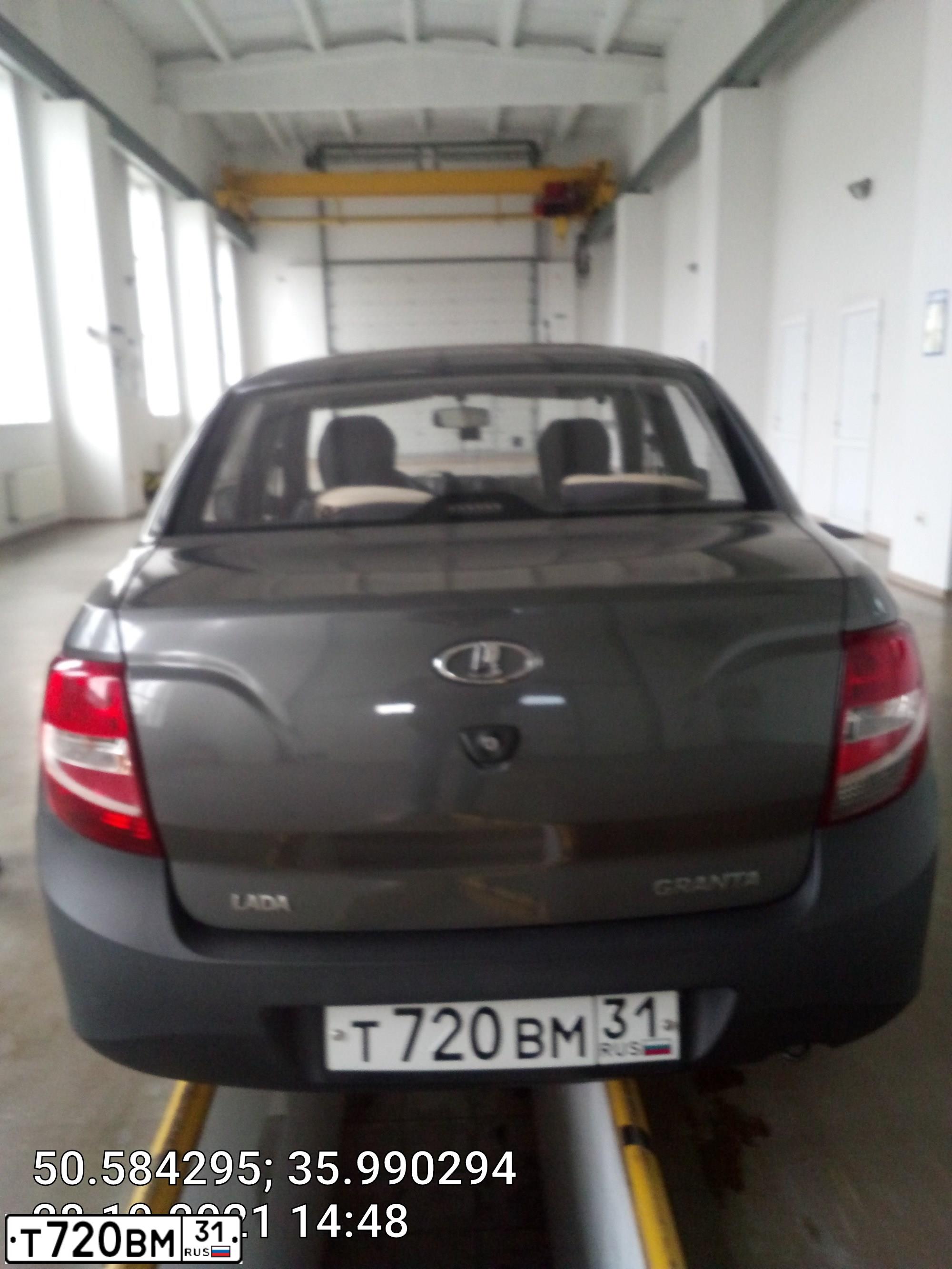 Фото автомобиля LADA 2190 GRANTA, 2013 — госномер Т720ВМ31. Цвет: СЕРЕБРИСТО-СЕРЫЙ