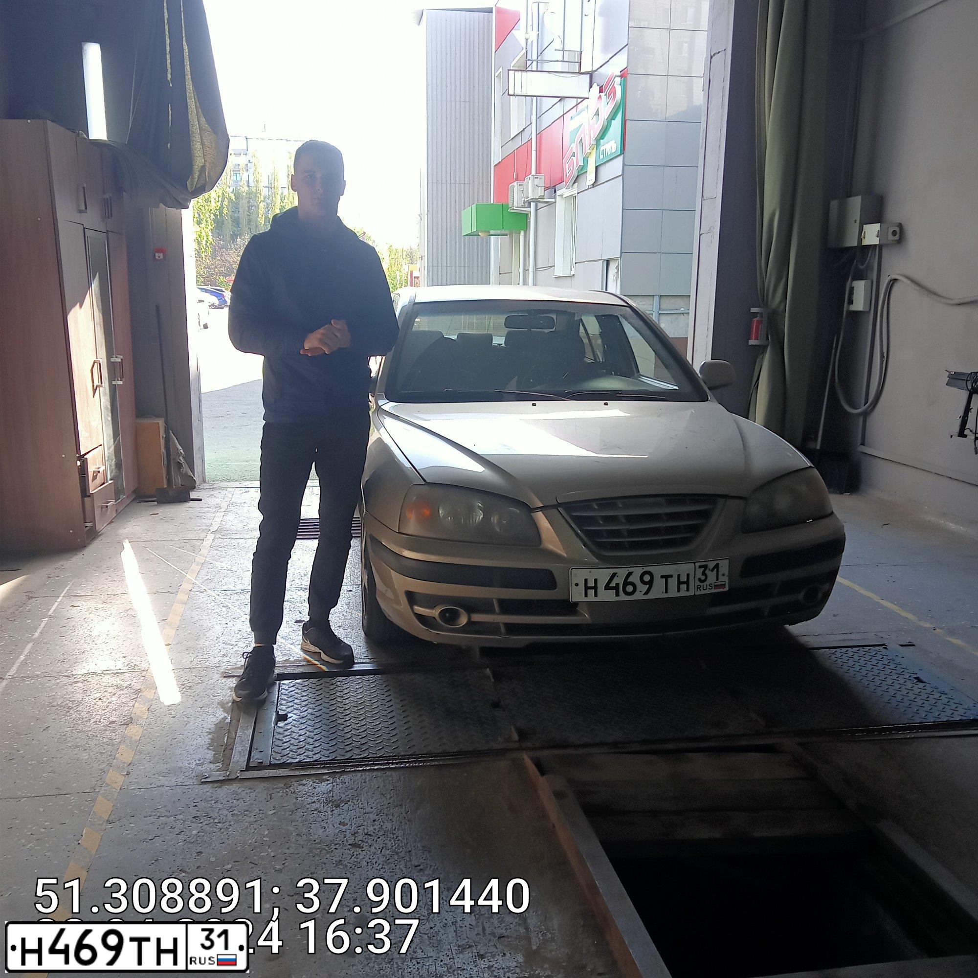 Фото автомобиля HYUNDAI ELANTRA, 2004 — госномер Н469ТН31. Цвет: СЕРЫЙ