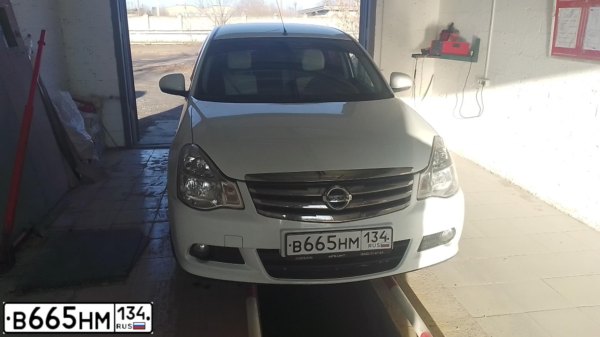 Фото автомобиля NISSAN ALMERA /AVTOVAZ/, 2015 — госномер В665НМ134. Цвет: БЕЛЫЙ