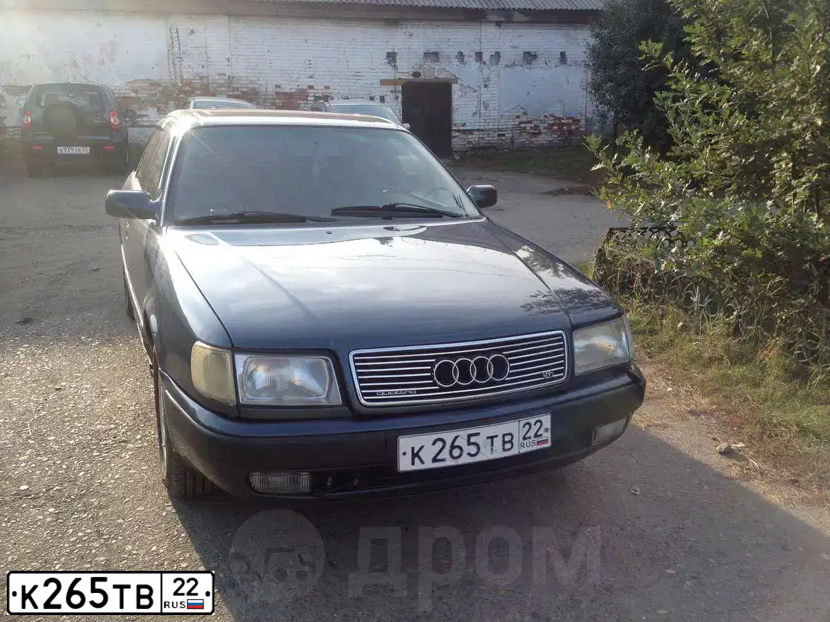 Фото автомобиля AUDI 100, 1992 — госномер К265ТВ22. Цвет: ТЕМНО СЕРО-СИНИЙ