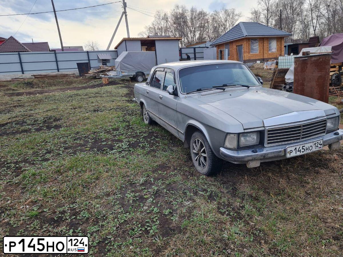 Фото автомобиля GAZ 3102 WOLGA, 2008 — госномер Р145НО124. Цвет: Серый