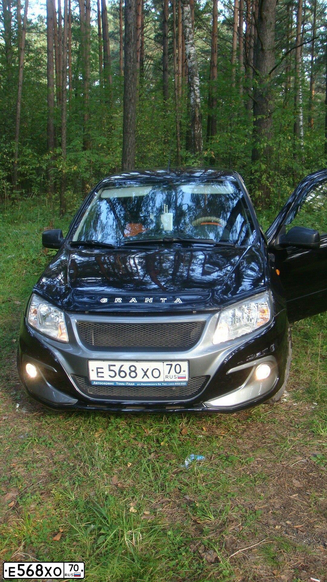 Фото автомобиля FORD D FOCUS, 2006 — госномер Е568ОХ70. Цвет: СИНИЙ