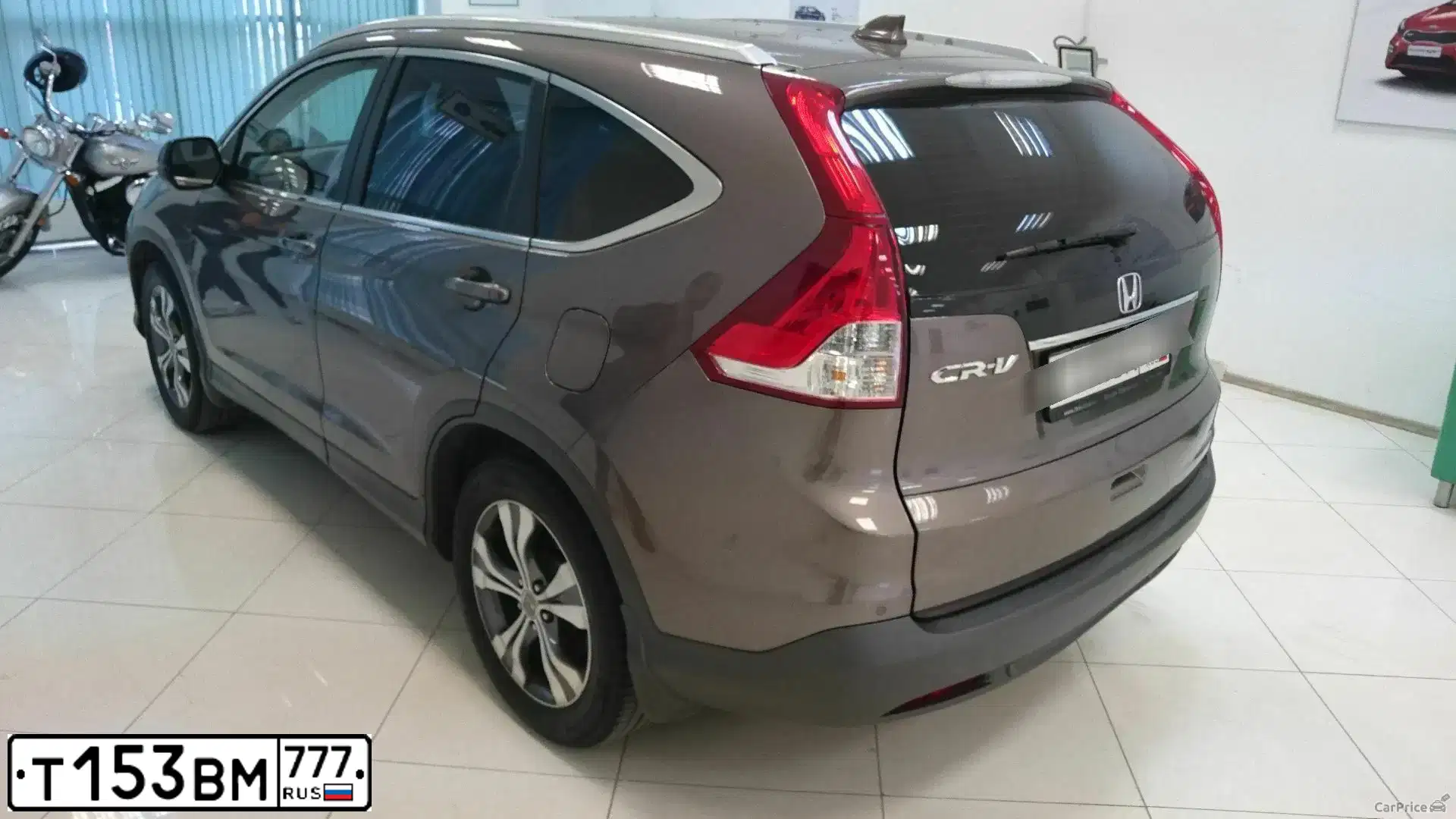 Фото автомобиля HONDA CR-V, 2014 — госномер Т153ВМ777. Цвет: СЕРО-КОРИЧНЕВЫЙ