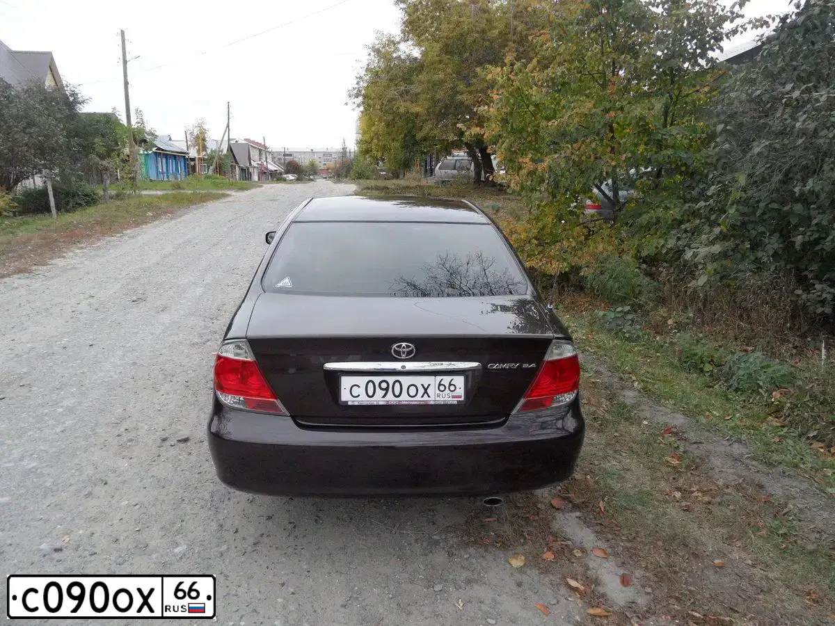 Фото автомобиля TOYOTA CAMRY, 2003 — госномер С090ОХ66. Цвет: ТЕМНО-БОРДОВЫЙ
