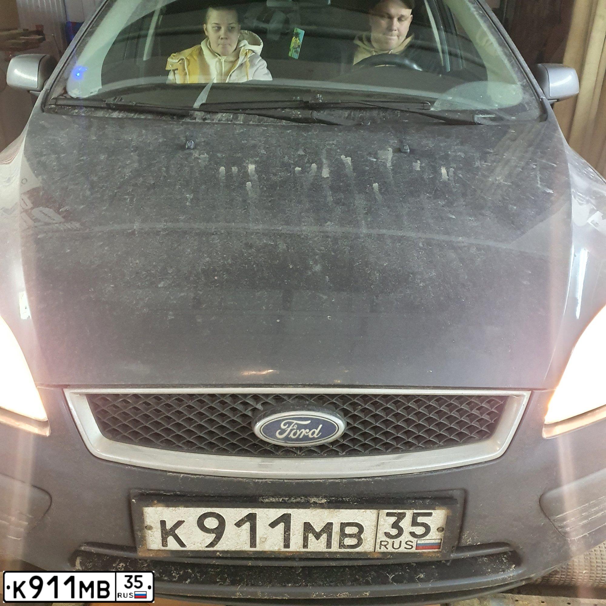Фото автомобиля FORD FOCUS, 2006 — госномер К911МВ35. Цвет: ТЕМНО-СЕРЫЙ