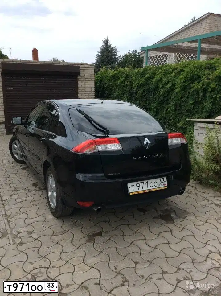 Фото автомобиля RENAULT LAGUNA, 2008 — госномер Т971ОО33. Цвет: ЧЕРНЫЙ