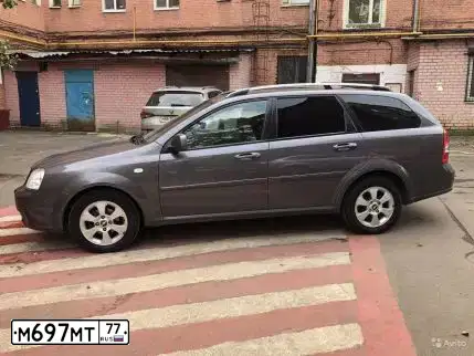 Фото автомобиля ВАЗ 21053, 1995 — госномер М697МТ77. Цвет: СИНЕ-ЗЕЛЕНЫЙ