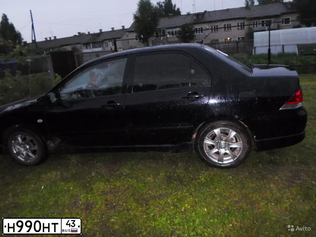 Фото автомобиля MITSUBISHI LANCER, 2005 — госномер Н990НТ43. Цвет: ЧЕРНЫЙ
