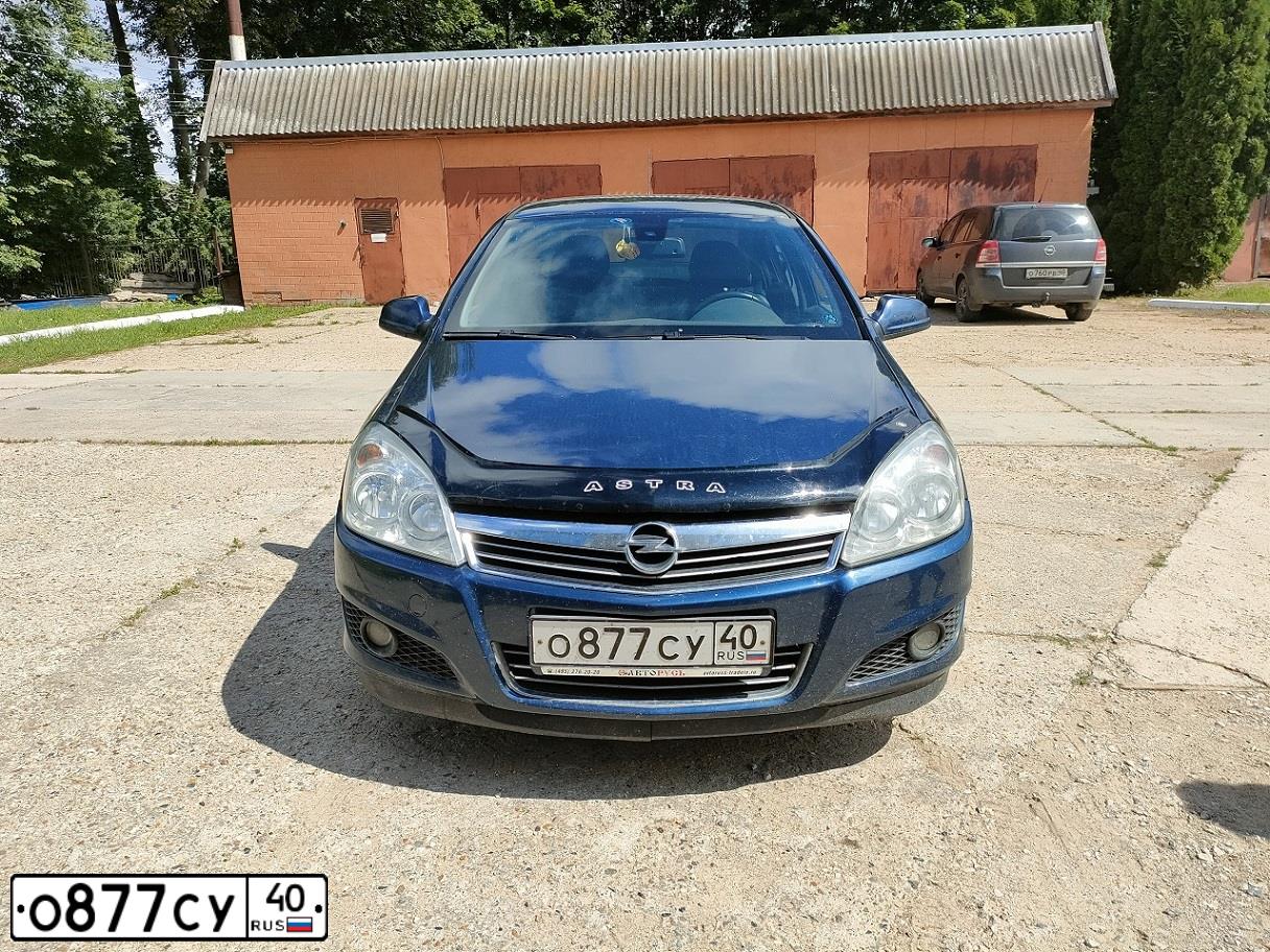 Фото автомобиля OPEL ASTRA, 2011 — госномер Н111МР40. Цвет: синий