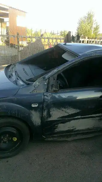 Фото автомобиля GAZ 3110 WOLGA, 2008 — госномер А195ОА21. Цвет: ЧЕРНЫЙ