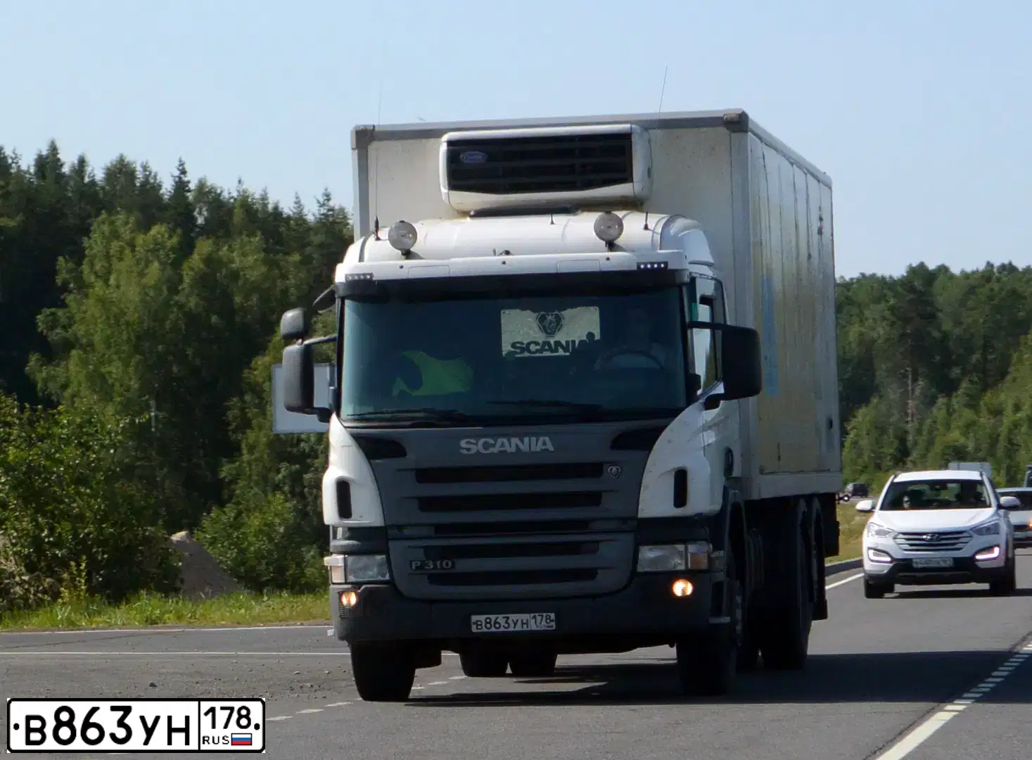 Фото автомобиля SCANIA SERIE P /6X2/, 2009 — госномер К764АО82. Цвет: Белый