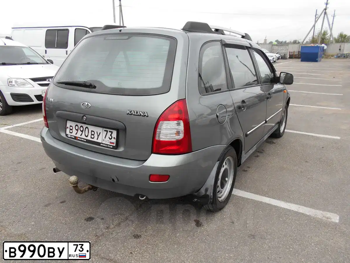 Фото автомобиля LADA 1117 KALINA, 2010 — госномер А180УК164. Цвет: Темно-серый металлик