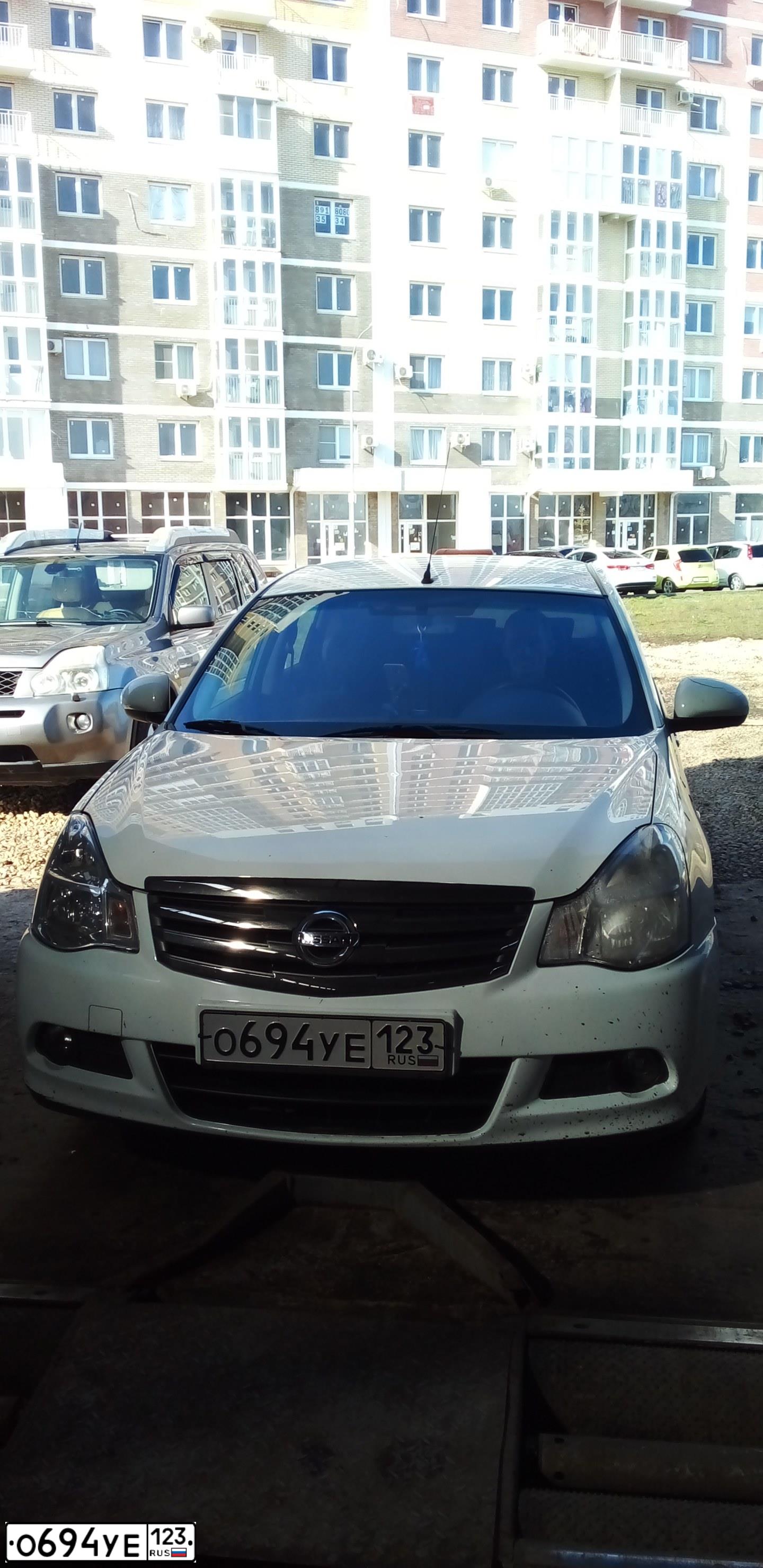 Фото автомобиля NISSAN ALMERA /AVTOVAZ/, 2018 — госномер О694УЕ123. Цвет: БЕЛЫЙ