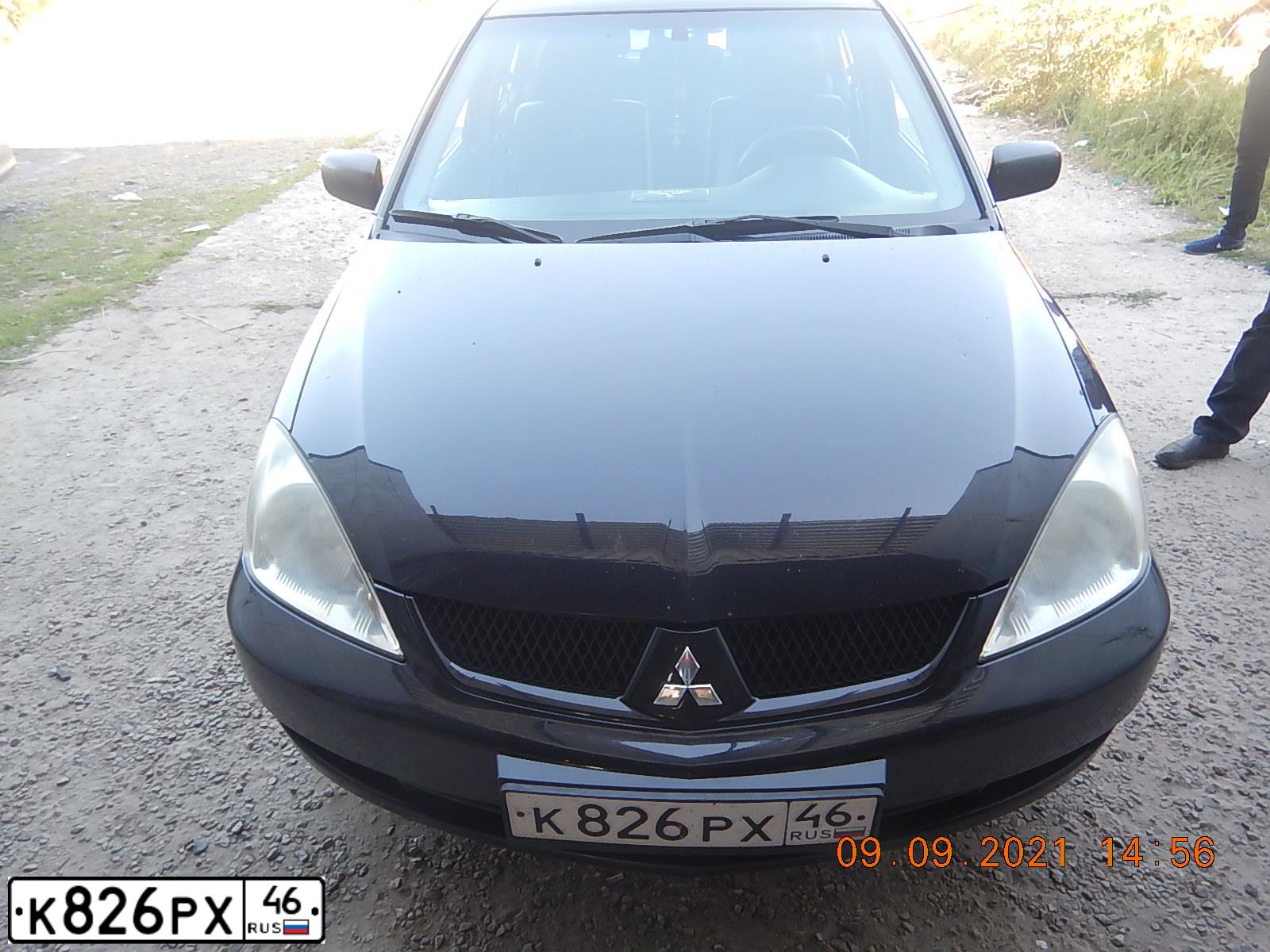 Фото автомобиля MITSUBISHI LANCER, 2009 — госномер К826РХ46. Цвет: ЧЕРНЫЙ