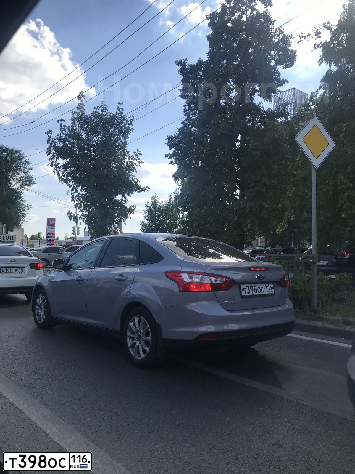 Фото автомобиля FORD FOCUS, 2013 — госномер Т398ОС116. Цвет: СЕРО-ГОЛУБОЙ