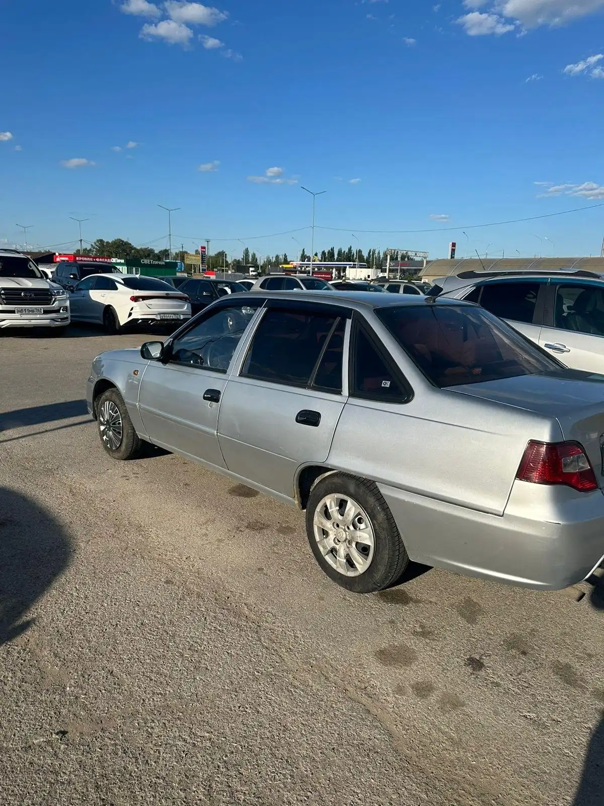 Фото автомобиля DAEWOO NEXIA, 2012 — госномер К330ТУ763. Цвет: Серебристый