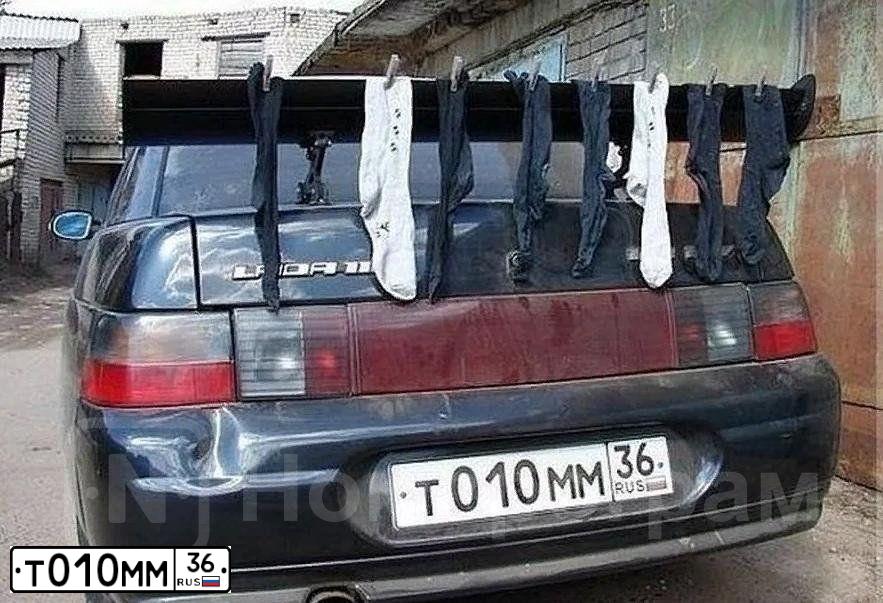 Фото автомобиля VAZ ВАЗ 21104, 2006 — госномер Т010ММ36. Цвет: ЧЕРНЫЙ