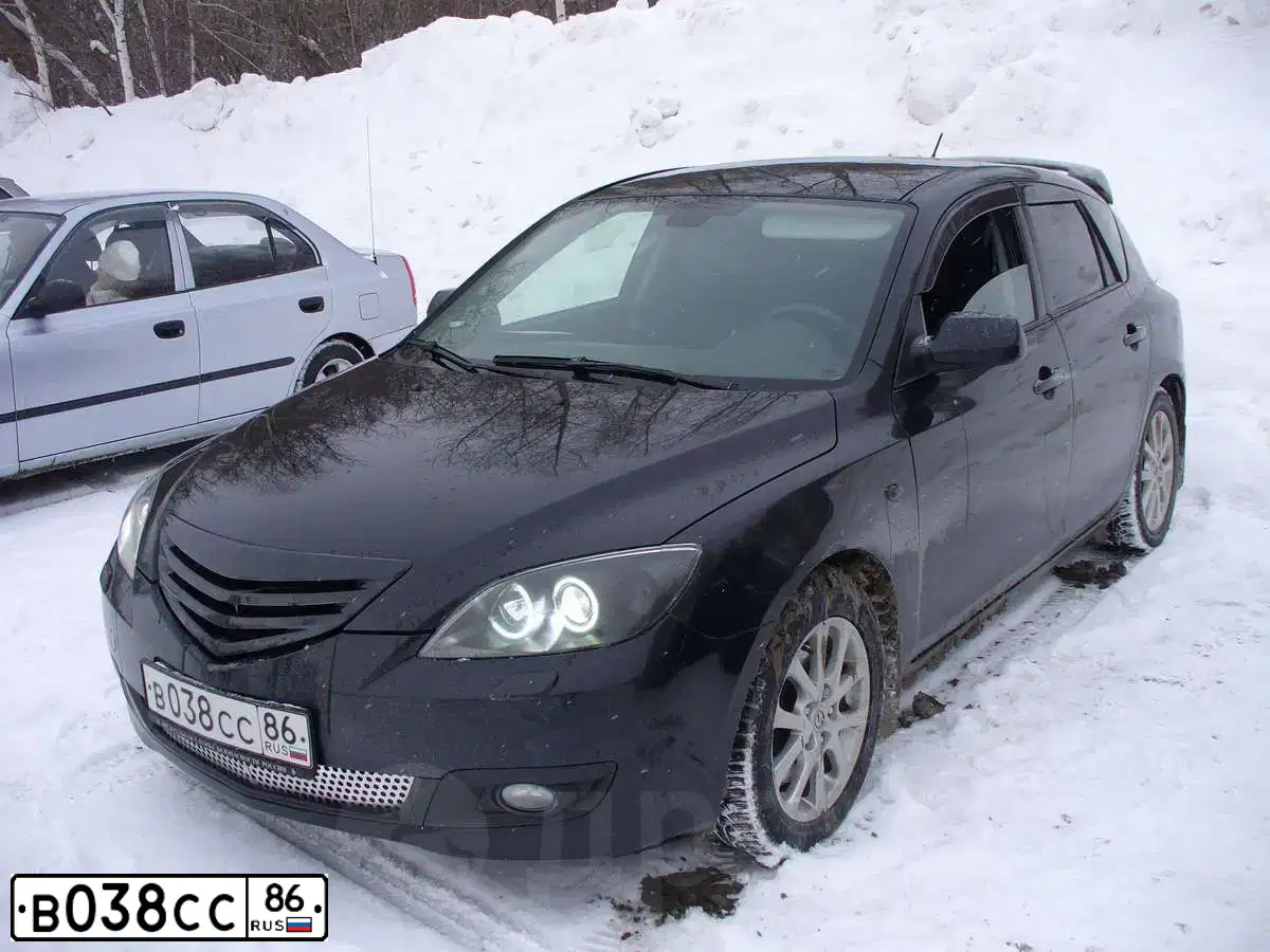 Фото автомобиля MAZDA 3, 2008 — госномер О733УУ72. Цвет: ЧЕРНЫЙ