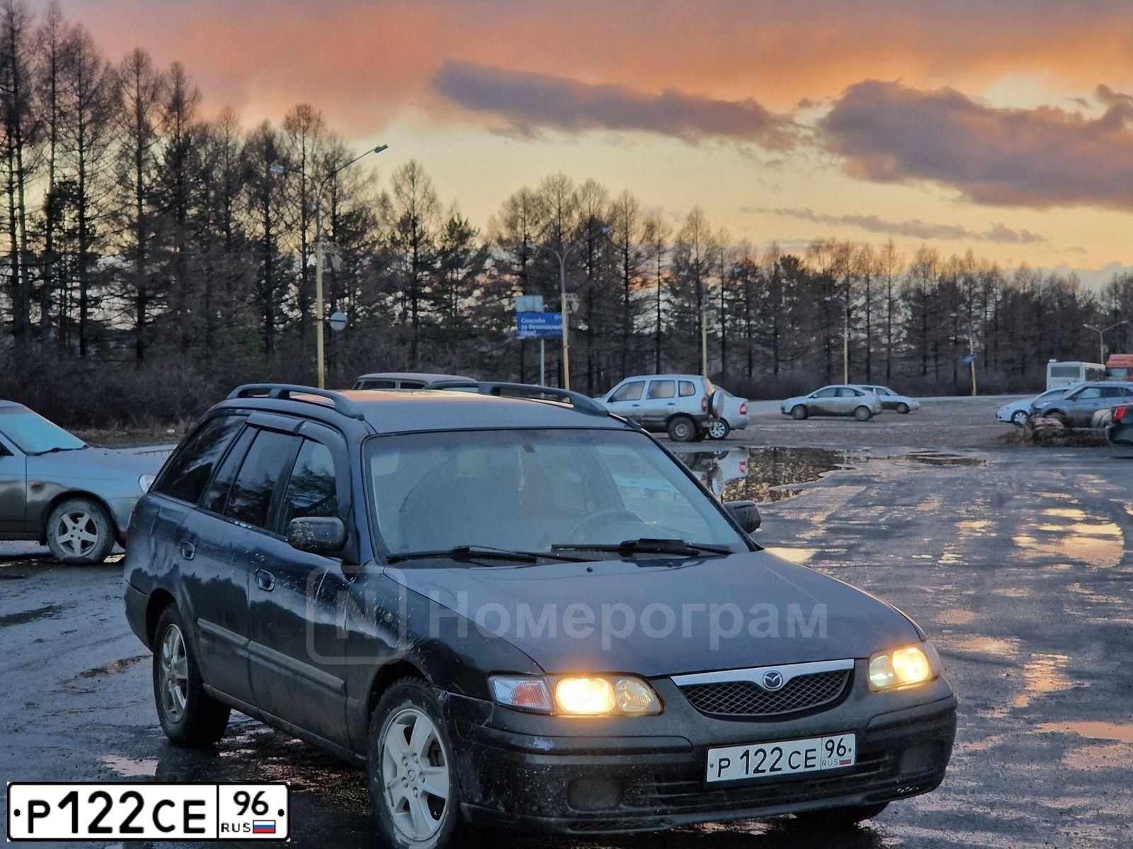 Фото автомобиля MAZDA МАЗДА 626, 1999 — госномер Р122СЕ96. Цвет: Темно-синий