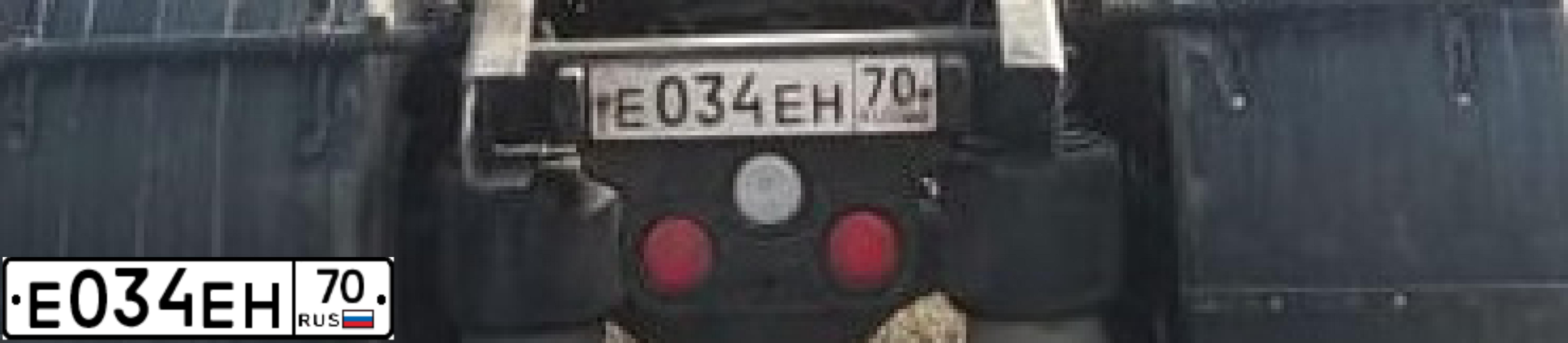 Фото автомобиля FREIGHTLINER COLUMBIA, 2003 — госномер Е034ЕН70. Цвет: ЖЁЛТЫЙ