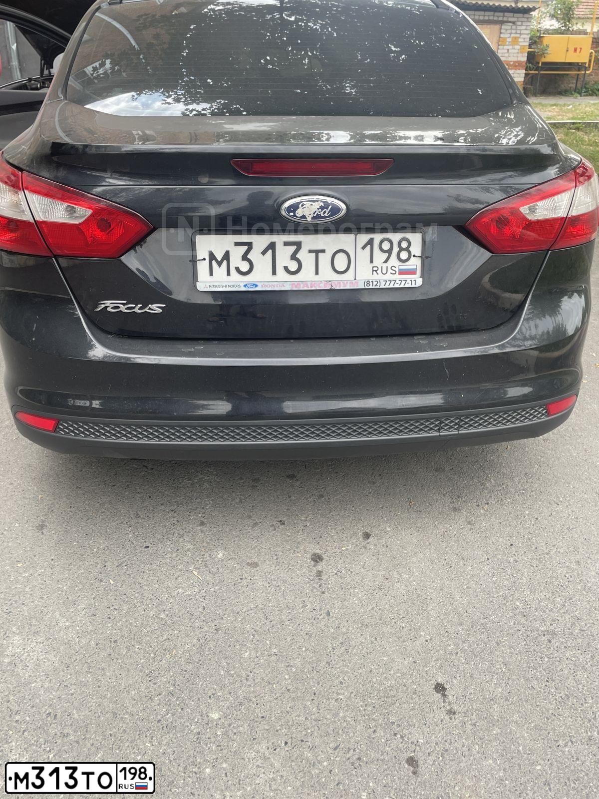 Фото автомобиля FORD FOCUS, 2013 — госномер М313ТО198. Цвет: ЧЕРНЫЙ