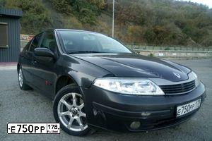 Фото автомобиля RENAULT LAGUNA, 2001 — госномер В565МВ82. Цвет: БЕЛЫЙ СЕРЫЙ