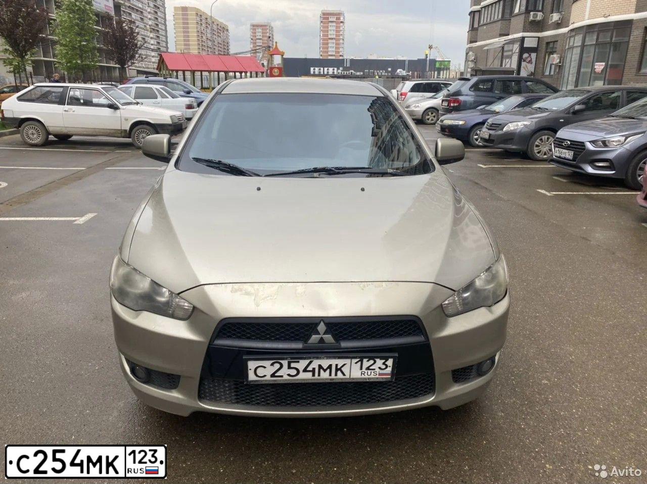 Фото автомобиля MITSUBISHI LANCER, 2010 — госномер Х660МА174. Цвет: синий