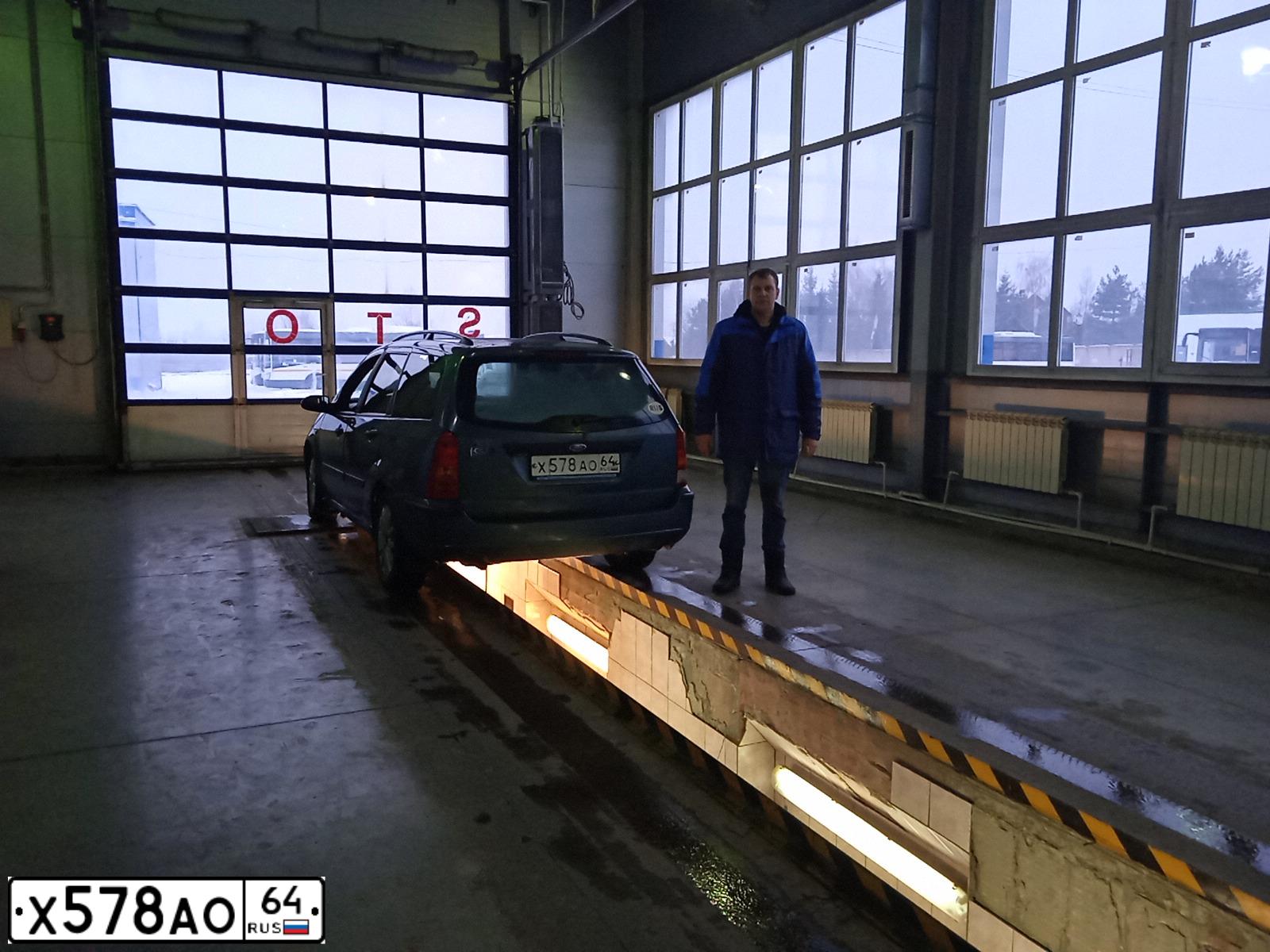 Фото автомобиля FORD FOCUS, 2003 — госномер В977УС790. Цвет: СЕРО-БИРЮЗОВЫЙ