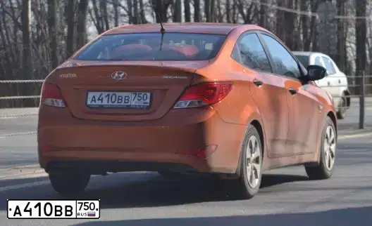 Фото автомобиля HYUNDAI SOLARIS, 2015 — госномер А410ВВ750. Цвет: Оранжевый