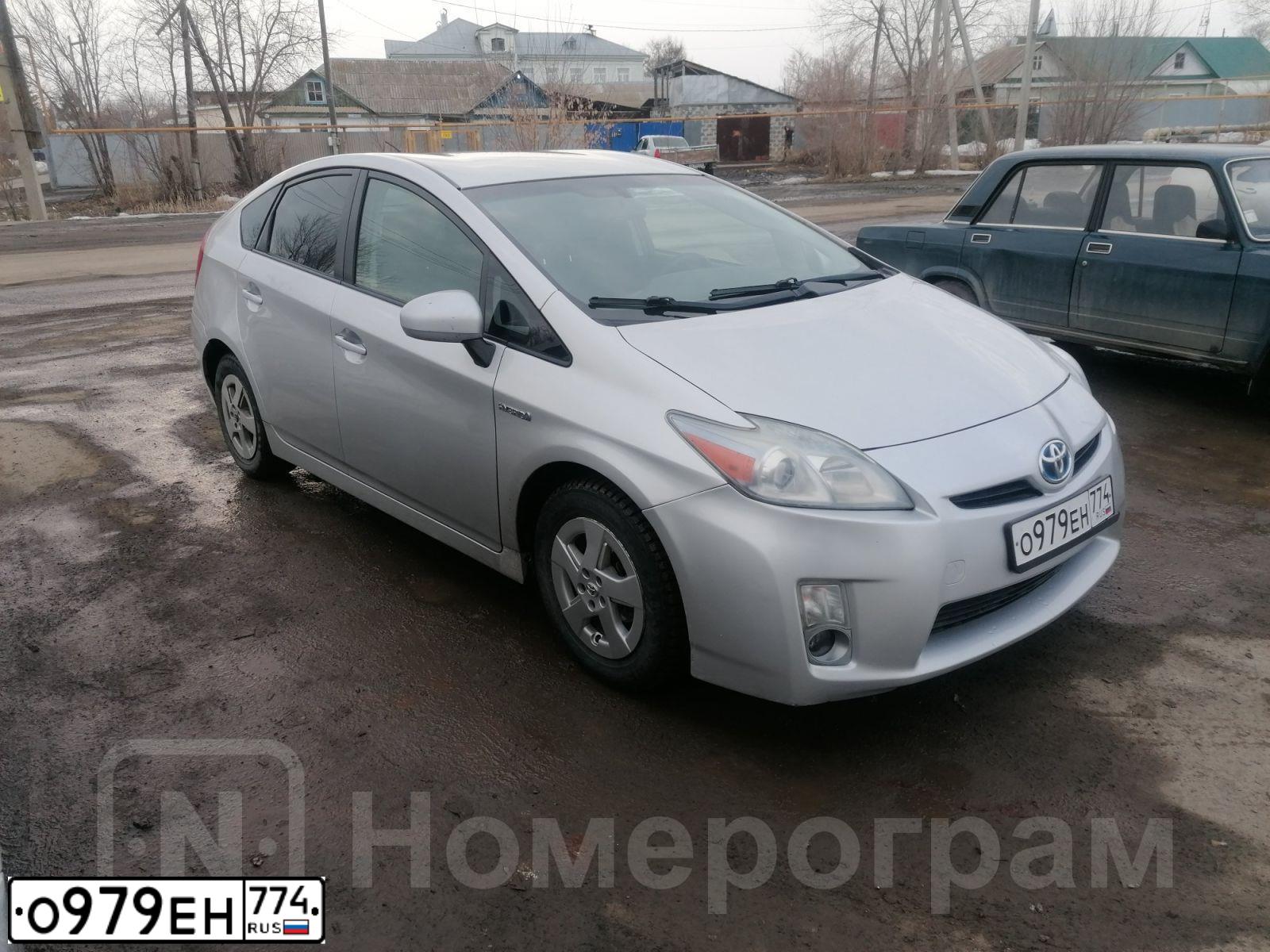 Фото автомобиля TOYOTA PRIUS, 2010 — госномер О801ОМ196. Цвет: СВЕТЛО-СЕРЫЙ