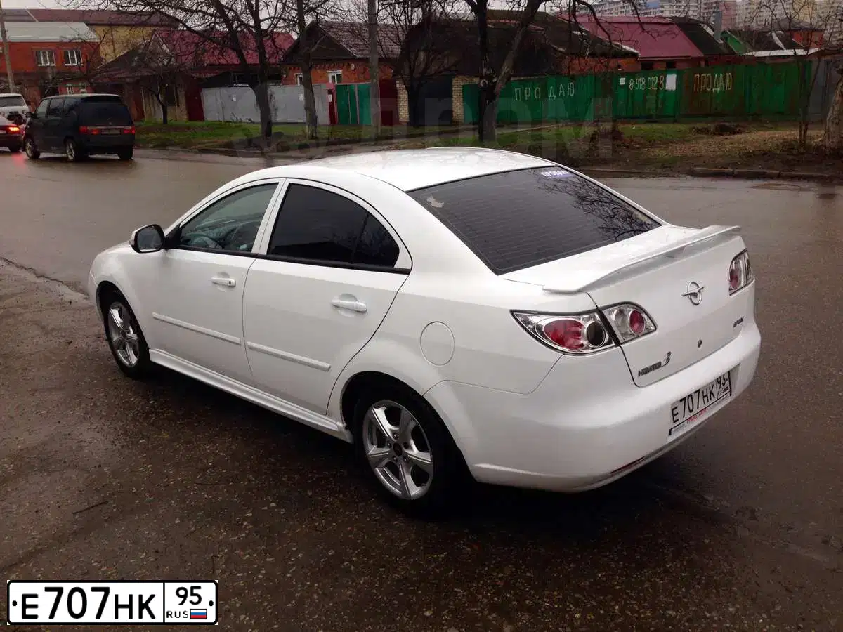Фото автомобиля FORD FOCUS, 2011 — госномер Е707НК95. Цвет: Серебристый